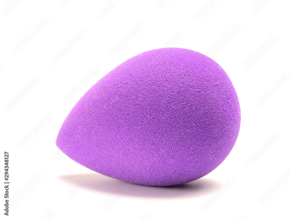 sponge for makeup lies on a white background sponge for makeup lies on a white background