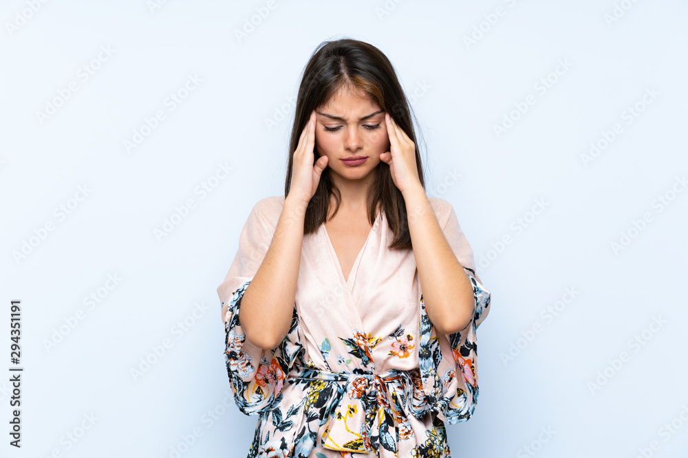 Caucasian girl with kimono over isolated blue background unhappy and frustrated with something. Negative facial expression Caucasian girl with kimono over isolated blue background unhappy and frustrated with something. Negative facial expression