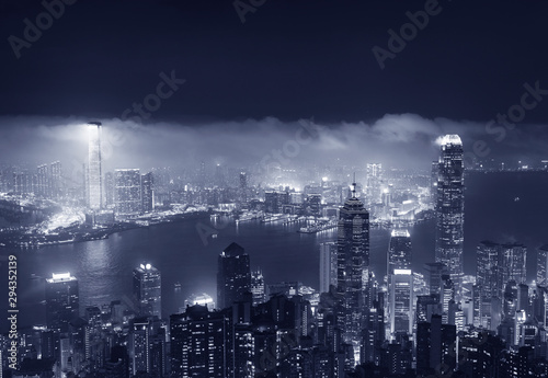 Photography Misty night view of Victoria harbor in Hong Kong city