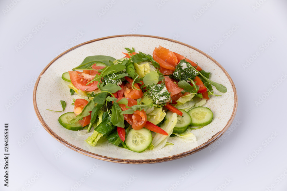 Various fresh mix salad with salmon, tomato, cucumber, onion, bell pepper, healthy food and diet menu. Various fresh mix salad with salmon, tomato, cucumber, onion, bell pepper, healthy food and diet menu.