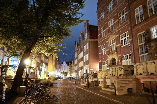 Gdansk, Poland - September 2019: View of the night streets of the city. The architecture of the old city in the night.