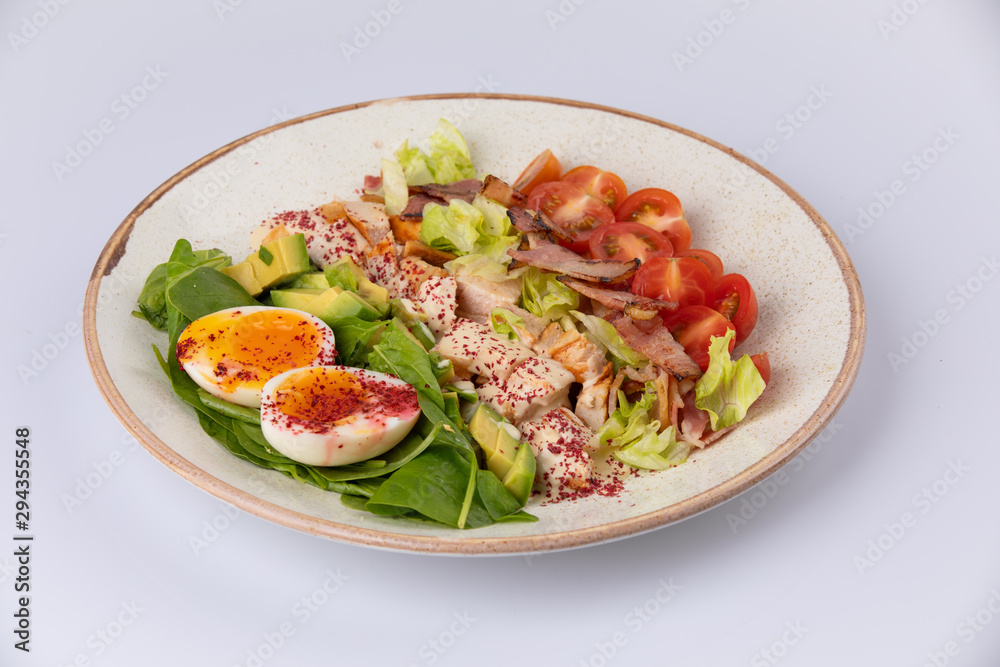 Healthy Hearty Cobb Salad with Chicken, Bacon, Tomato, avocado and Eggs