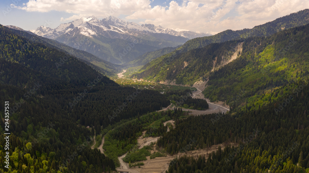 Racha is one of the mountain regions of Georgia. The valley of the river Rioni, near the village of Shovi. Caucasus Mountains. Spring 2019 Racha is one of the mountain regions of Georgia. The valley of the river Rioni, near the village of Shovi. Caucasus Mountains. Spring 2019