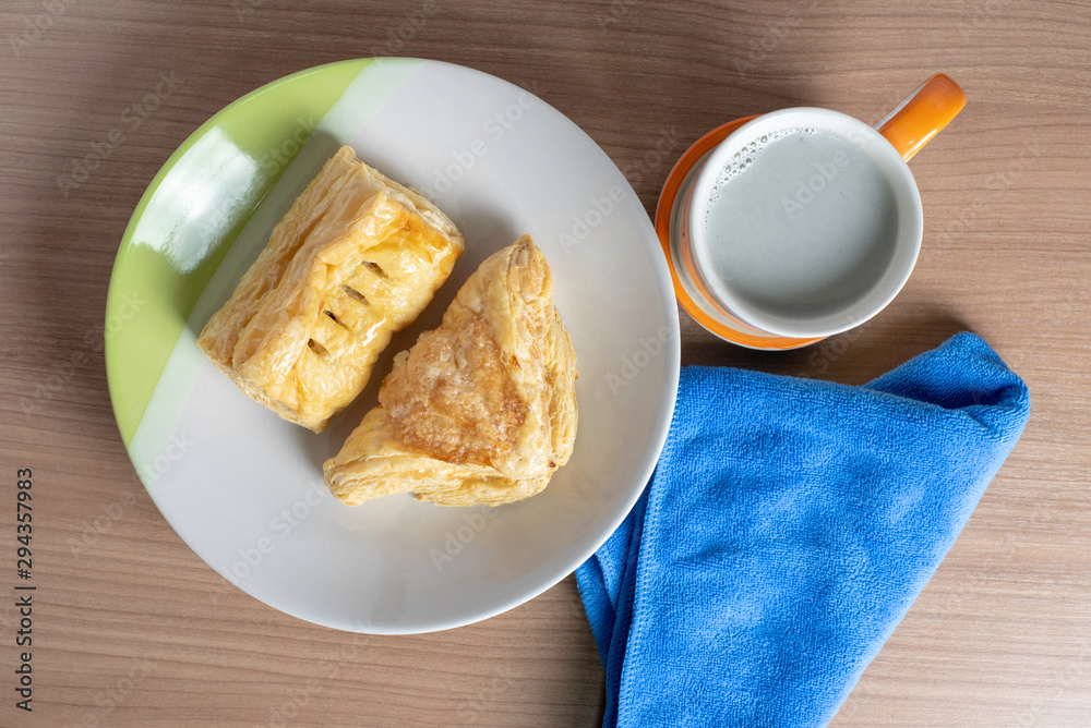 breakfast with cup of fresh milk and croissants breakfast with cup of fresh milk and croissants