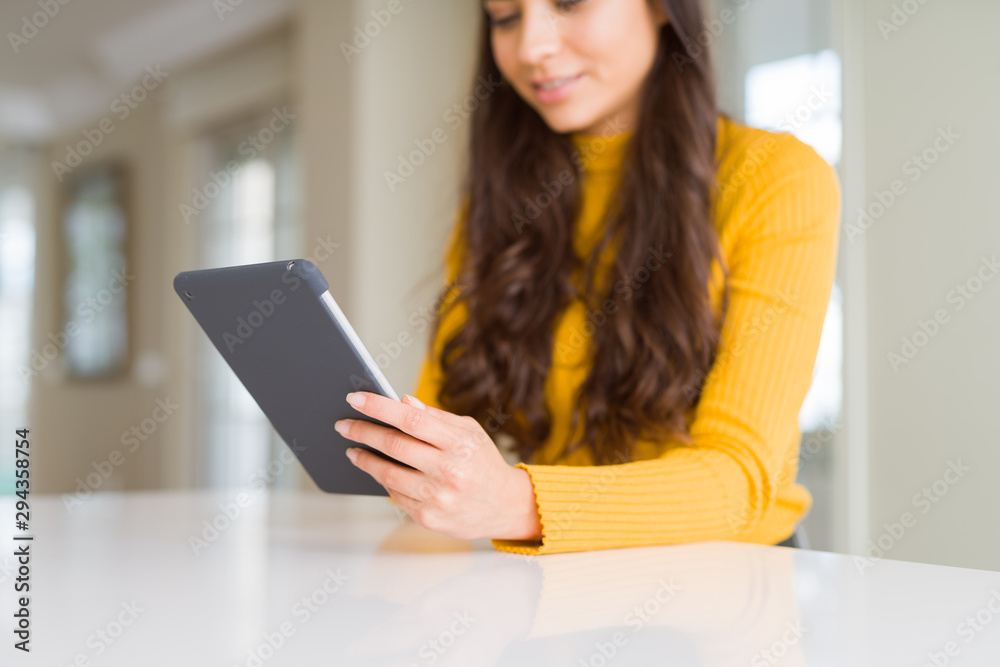 Beautiful young woman working using touchpad tablet Beautiful young woman working using touchpad tablet
