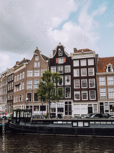 The typical elongated, crooked and charming rows of houses in Amsterdam.
