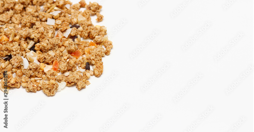 Granola with fruits and nuts. Baked muesli mix. Super food concept. Breakfast cereals. Kids diet. White isolation background. Granola with fruits and nuts. Baked muesli mix. Super food concept. Breakfast cereals. Kids diet. White isolation background.