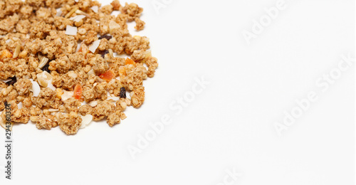 Granola with fruits and nuts. Baked muesli mix. Super food concept. Breakfast cereals. Kids diet. White isolation background. 