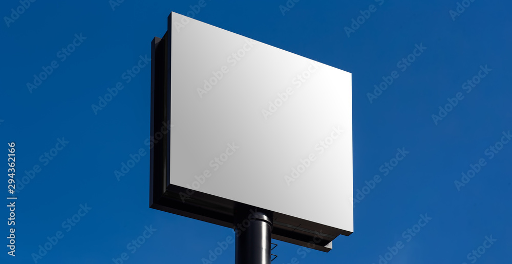 blank billboard on background of blue sky with no clouds blank billboard on background of blue sky with no clouds