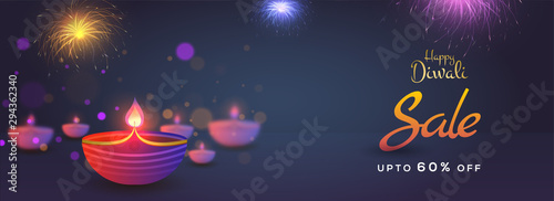 Happy Diwali sale up to 60% discount offer and illuminated oil lamp on blurred background. Website header or banner design for advertisement concept.
