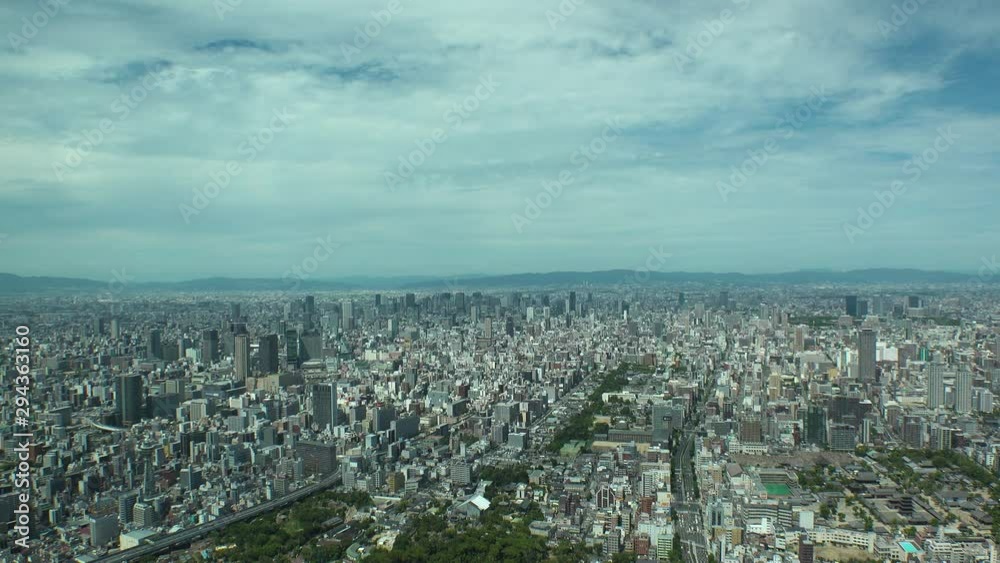OSAKA, JAPAN - CIRCA SEPTEMBER 2019 : Aerial high angle view of CITYSCAPE of OSAKA in daytime. View of buildings around Namba, Shinsaibashi, Umeda and Osaka station. OSAKA, JAPAN - CIRCA SEPTEMBER 2019 : Aerial high angle view of CITYSCAPE of OSAKA in daytime. View of buildings around Namba, Shinsaibashi, Umeda and Osaka station.