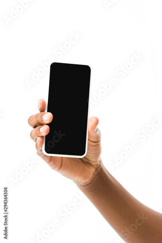 cropped view of african american woman holding smartphone with copy space isolated on white