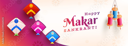 Website header or banner design decorated with colorful kites and string spools hang on floral abstract background for Happy Makar Sankranti celebration.