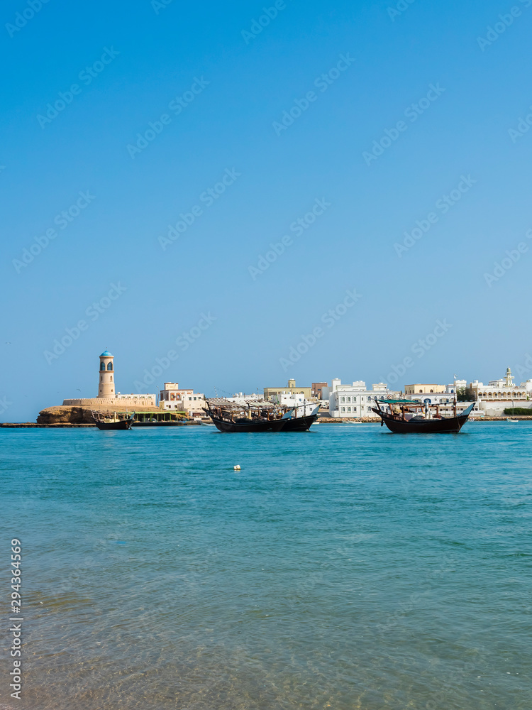 View of Sur and the lighthouse Al-Ayjah, coast at Ash Sharqiyah North, Ad Daffah, Sultanate of Oman, Arabia