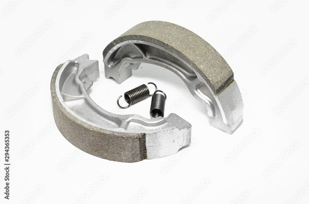 Motorcycle brake pads on a white background. Motorcycle brake pads on a white background.