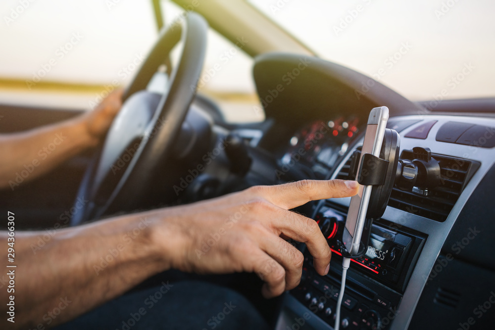 Man using phone while driving
