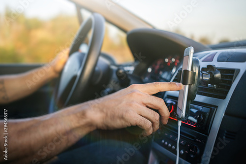 Man using phone while driving