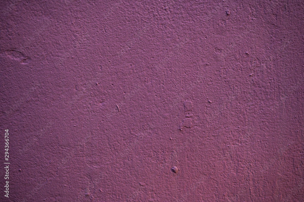 Fototapeta premium Texture of an old wall covered with paint. Background image of a worn paint coated surface
