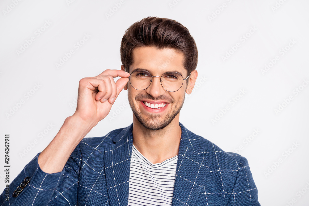 Close-up portrait of his he nice attractive cheerful cheery content top skilled executive HR director recruiter wearing checked blazer touching specs isolated over light white pastel background Close-up portrait of his he nice attractive cheerful cheery content top skilled executive HR director recruiter wearing checked blazer touching specs isolated over light white pastel background