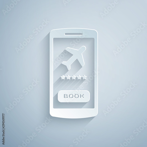 Paper cut Smartphone with electronic boarding pass airline ticket icon isolated on grey background. Passenger plane mobile ticket for web and app. Paper art style. Vector Illustration