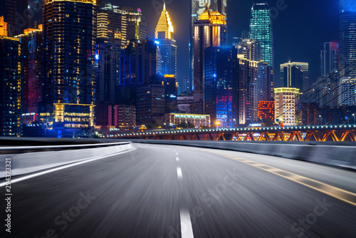 The expressway and the modern city skyline are in Chongqing, China. © onlyyouqj