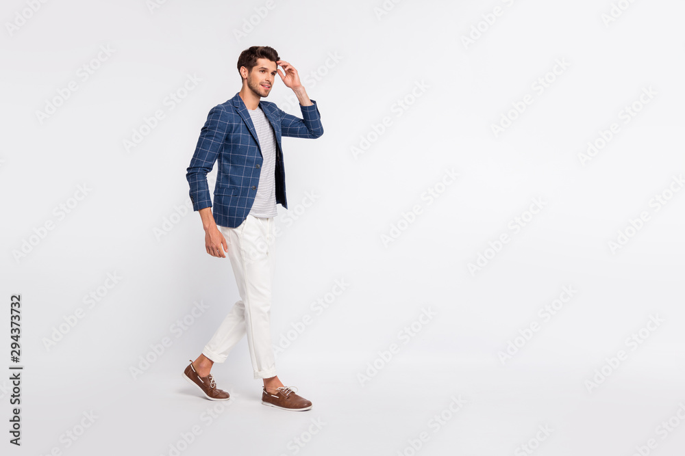 Full length profile side photo of attractive millennial think wear plaid blazer jacket pants trousers footwear isolated over white background
