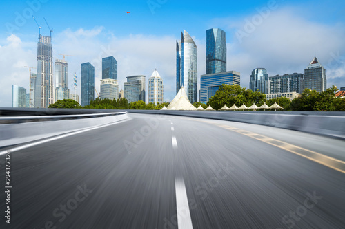 empty highway with cityscape and skyline of qingdao China.