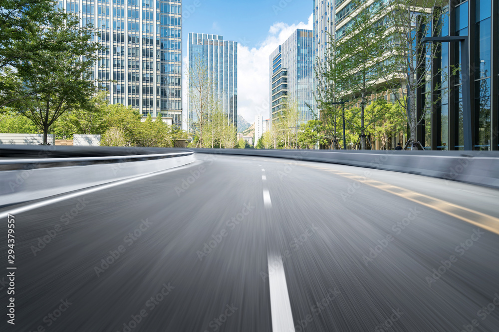 Obraz premium empty highway with cityscape and skyline of qingdao,China.