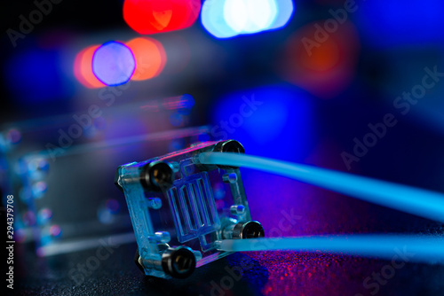 microfluidic device Instrument that uses micro amounts of fluid on a microchip to do certain laboratory tests. photo