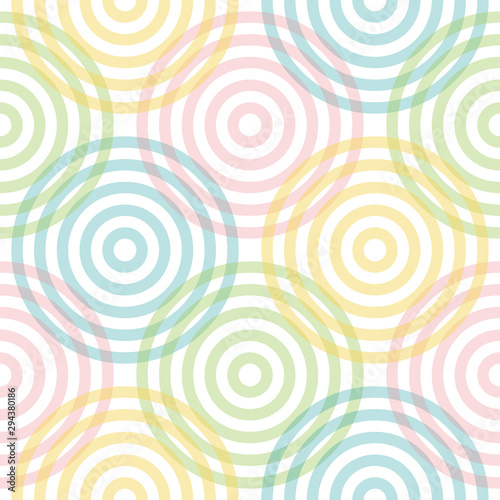 Seamless vector geometry pattern in a modern, stylish, and minimal fashion. The abstract tiles can be repeated endlessly to create perfect pattern/wallpaper of pink yellow blue green color circles.