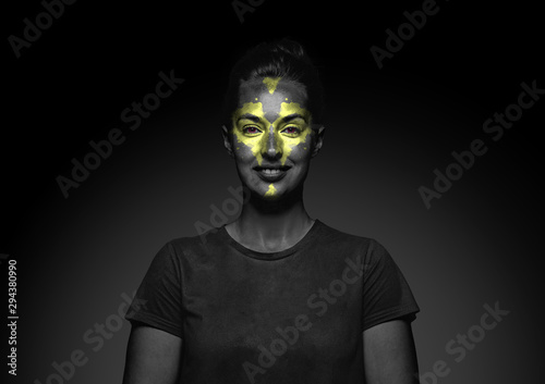 Discover what s inside you. Close up portrait of young woman isolated on black studio background. Bright neon light on the face. Halloween  scary look theme  october holidays  horror concept.