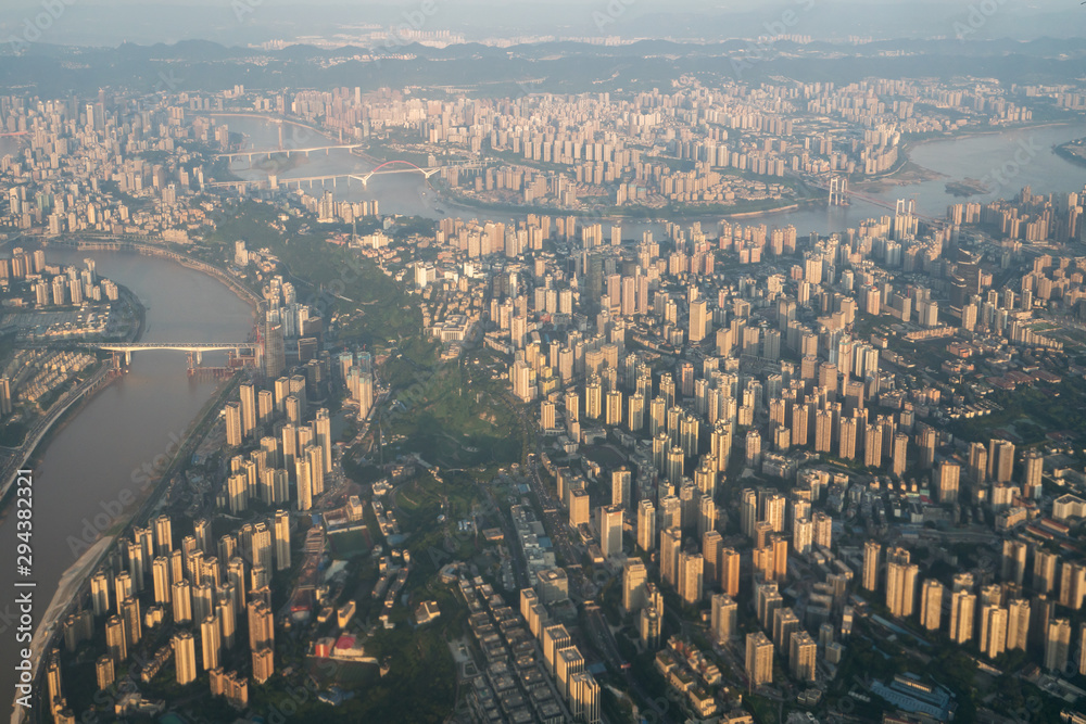 Fototapeta premium Overlooking the city on a plane