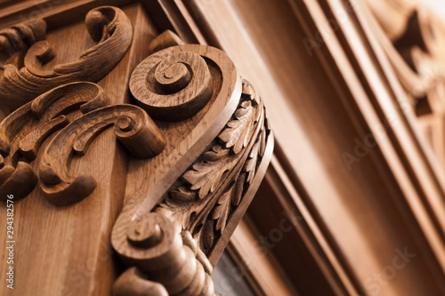 Carved decoration of vintage wooden cabinet