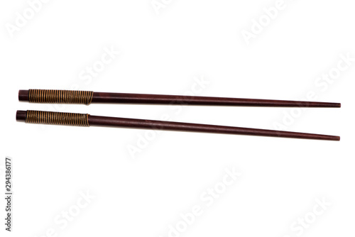 Wooden chopsticks isolated on the white background.