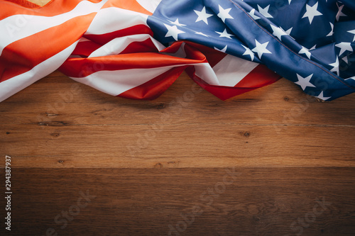 Fototapeta Naklejka Na Ścianę i Meble -  American flag on a old wooden. Symbol of freedom and democracy. Independence day.