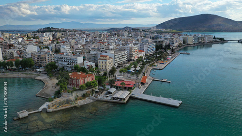 Aerial photo of famous seaside town of Halkida with beautiful clouds and deep blue sky, Evia island, Greece