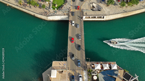 Aerial top view photo of famous old steel bridge of Halkida or Chalkida connecting mainland with Evia island, Greece photo
