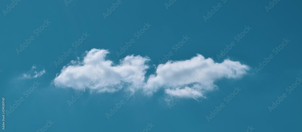 White clouds, on the blue sky, background