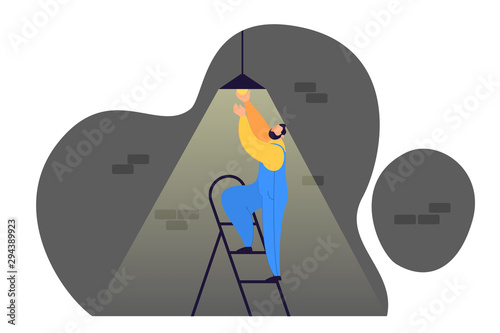 Worker electrician change light bulb