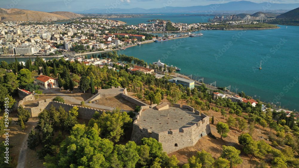 Aerial drone photo of famous castle of Karampampa built on top of hill in seaside town of Halkida or Chalkida, Evia island, Greece