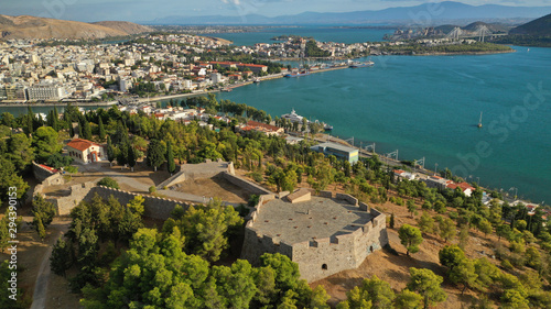 Aerial drone photo of famous castle of Karampampa built on top of hill in seaside town of Halkida or Chalkida, Evia island, Greece © aerial-drone