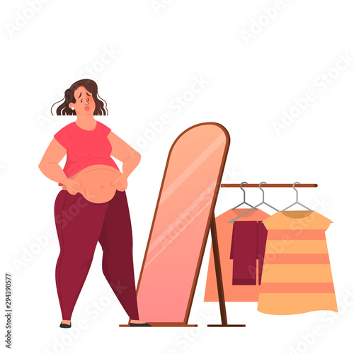 Sad fat woman looking in the mirror. Idea of obesity