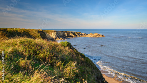 Clifftop View at Marsden Bay, located near South Shields, consisting of a sandy beach enclosed by Magnesian Limestone Cliffs and sea stacks photo