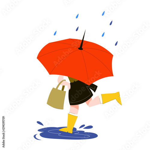 Woman behind the umbrella running under the rain
