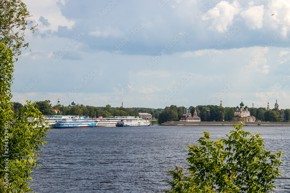 Uglich. Yaroslavl region. View of the Uglich Kremlin and the Volga river. The Church of St. Dimitry on the blood, Transfiguration Cathedral. Cruise ships berthed