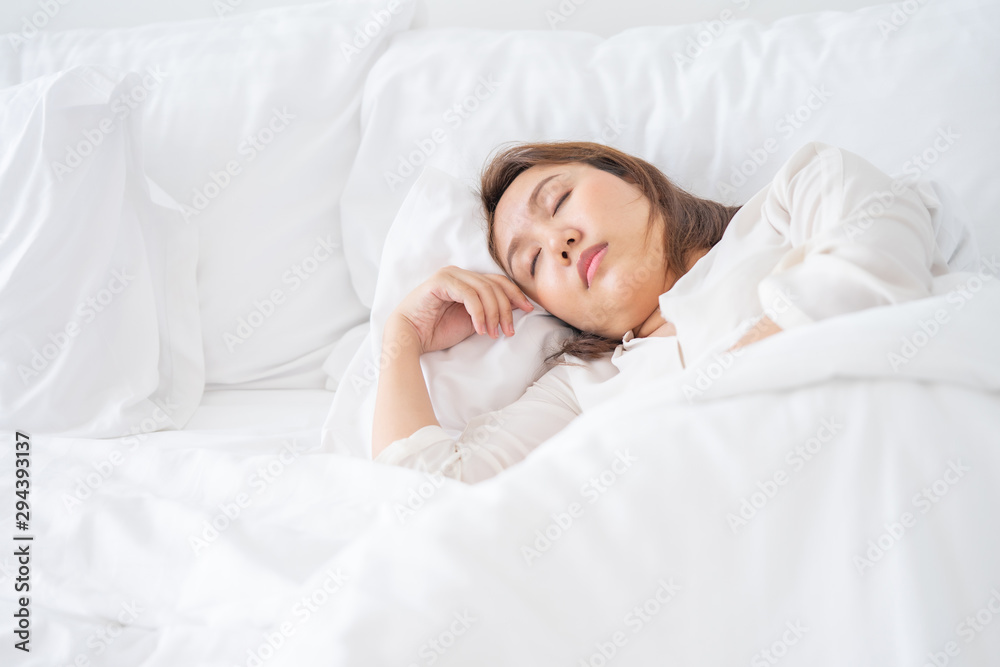 Asian beauty Sleeping deep in the bed in the bedroom To relax Hygienic sleep, relaxation concepts, body rejuvenation Asian beauty Sleeping deep in the bed in the bedroom To relax Hygienic sleep, relaxation concepts, body rejuvenation