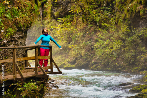 Принти на полотні An active woman hiking through the gorge in National Park