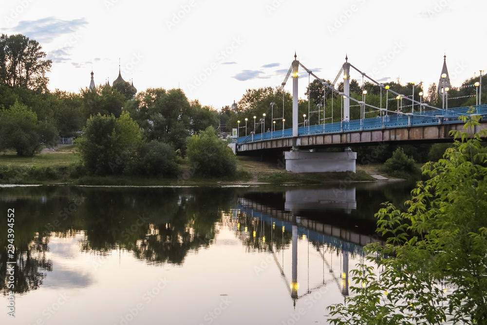 the cable-stayed bridge to Damansky island in Yaroslavl. Beautiful summer day in a beautiful Park