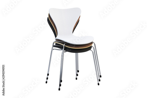 Stack of multicolored wooden mid-century chairs with metal legs. 3d render