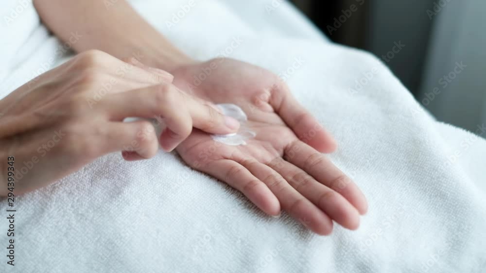 Woman applying moisturizing cream/lotion on hands, beauty concept. Woman applying moisturizing cream/lotion on hands, beauty concept.